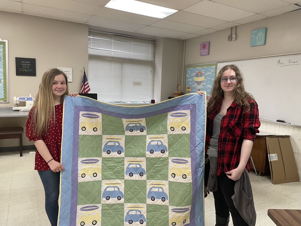 Senior Girls holding their blanket